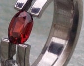 Titanium Tension Set Ring Band with Oval Red Brown Garnet and Diamonds