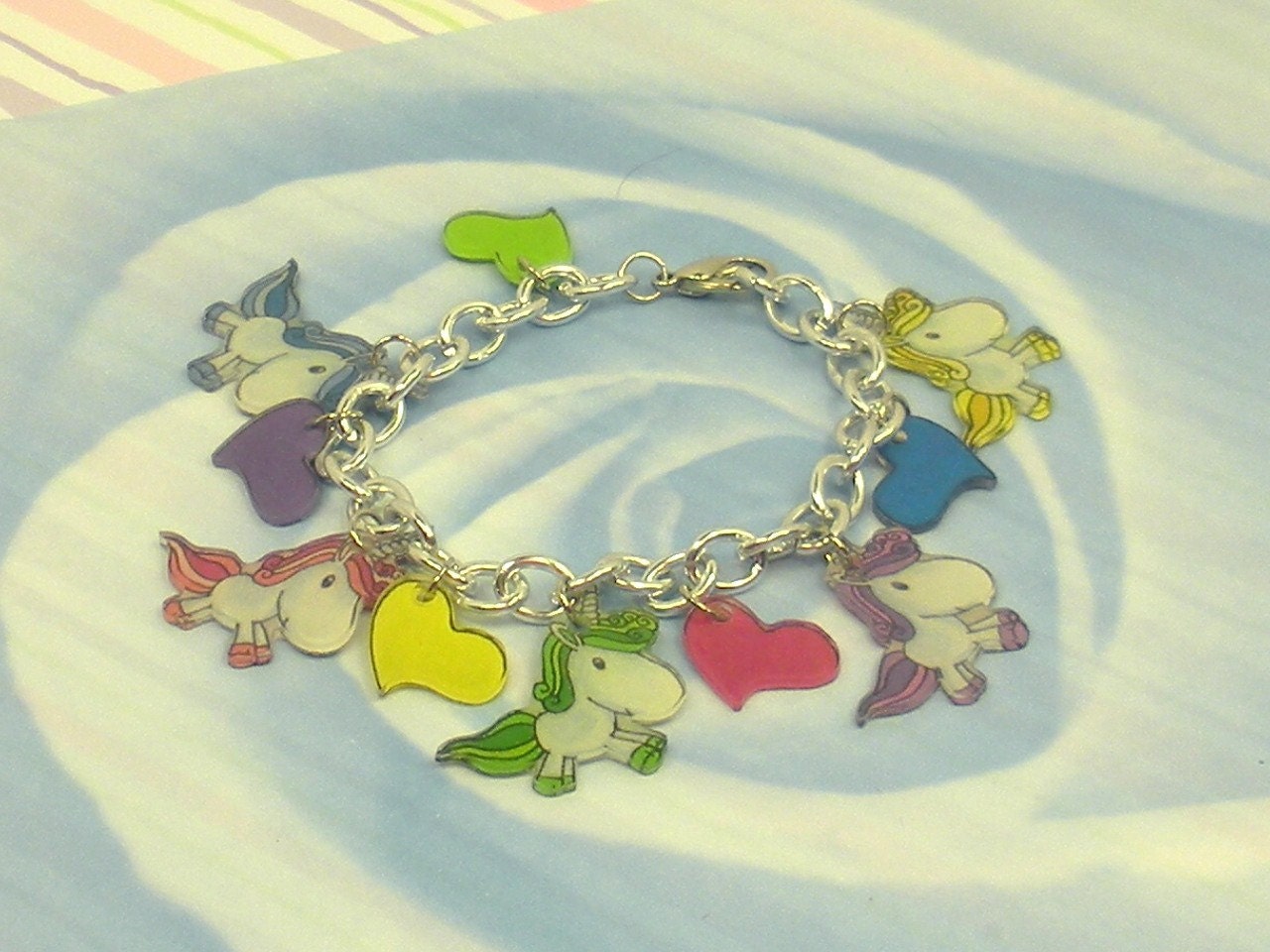 Unicorn Charm Bracelet With Hearts In Pink Purple Blue Green and Yellow