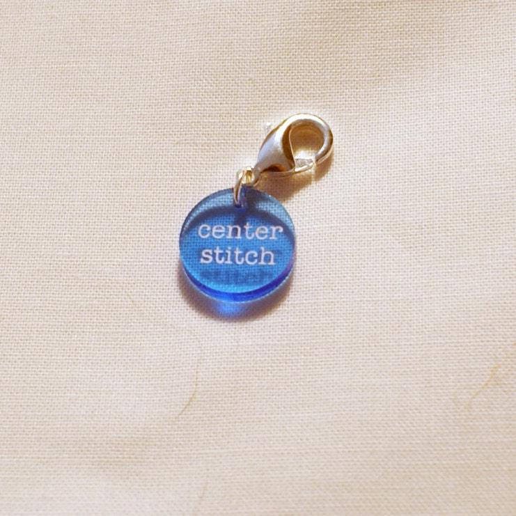 Center stitch clasped markers