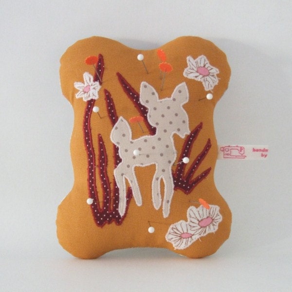 orange flower deer - pincushion
