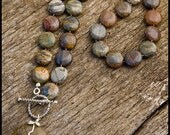 Sucked Back Up Into the Stars - sterling, silver leaf jasper and Owyhee picture jasper necklace