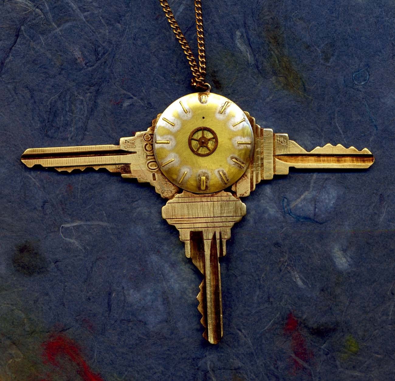 HANDMADE JEWELRY PENDANT...Trinity....handcrafted welded steampunk pendant which features 3 vintage keys and vintage watch face.