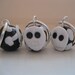 Skull and crossbones stitch marker set knit or crochet style black white