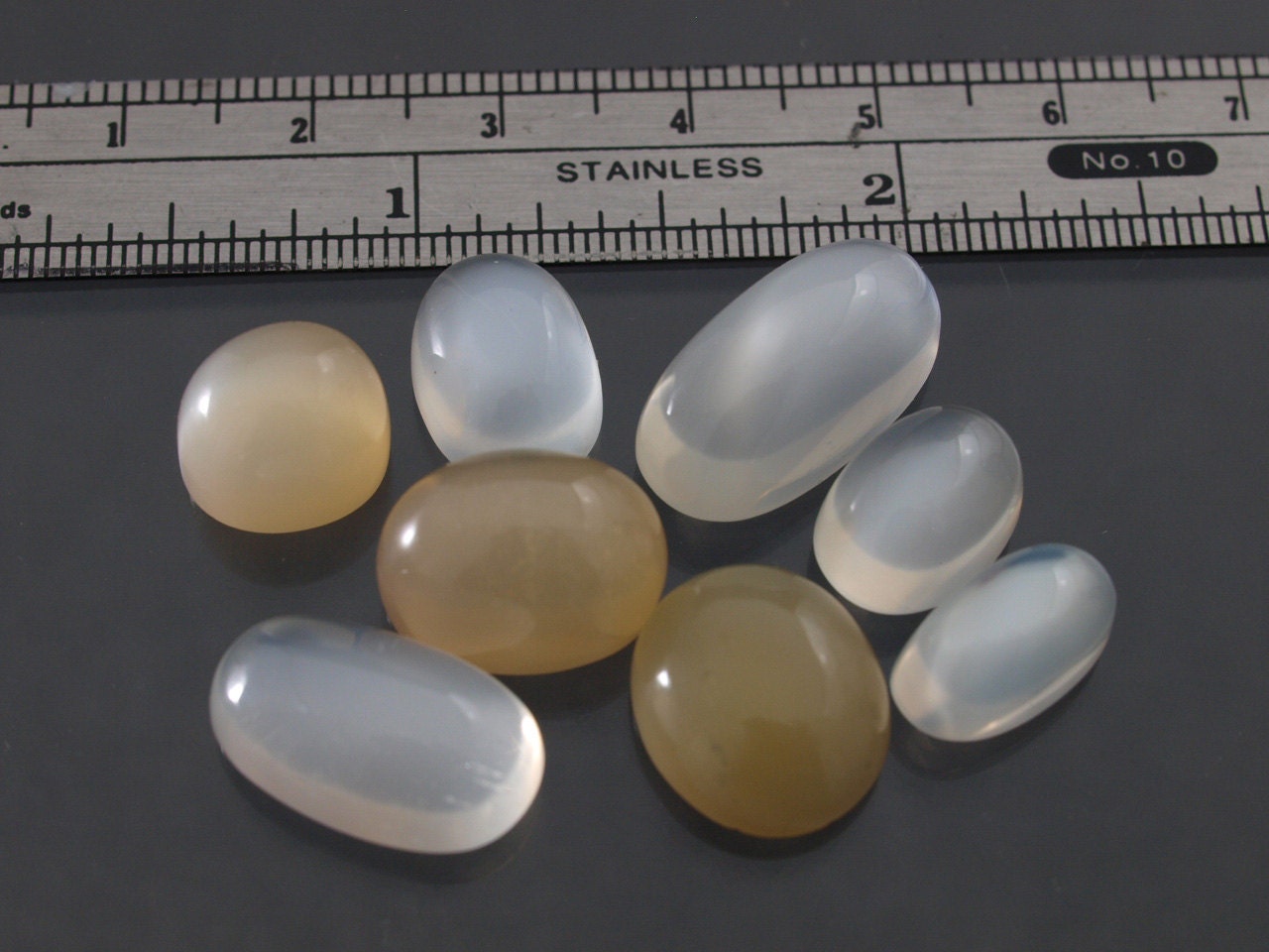 Reserved Wholesale lot of white or silver  moonstone only cabs in varied sizes - destashing my gem supply