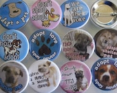 a whole bunch of dog rescue pins ... 1.25 inch ... 20 of them