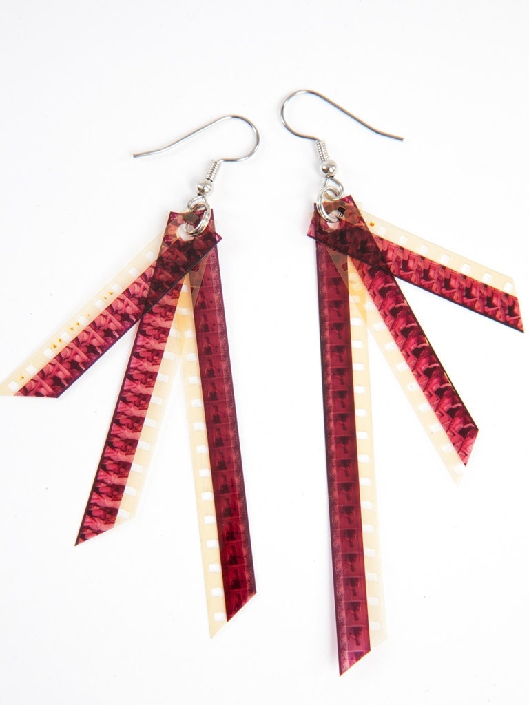 earrings . MATURE - 8 mm movie . recycled film . vintage porno