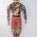 tattooed man doll