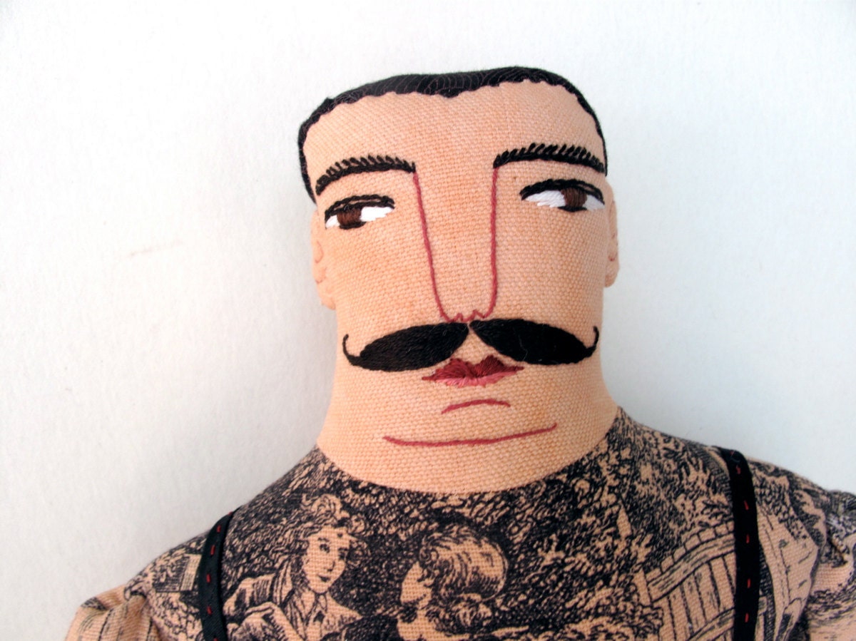 tattooed man doll