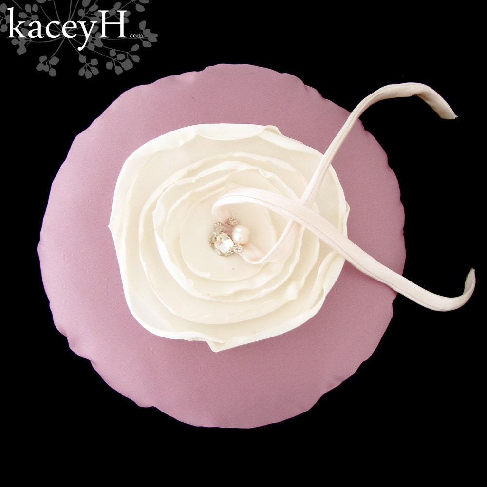 Round mauve pink ring pillow with an ivory flower.  Ring bearer pillow, ready to ship.