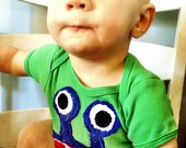 Royal Blue Bernard Monster on Green S/S Bodysuit available in sizes 3-6m, 6-12m, 12-18m