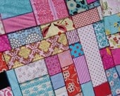 Amazing Price. Throw Quilt Top Kit in Pink, Red and Blue. Add optional batting, binding, and backing fabrics.