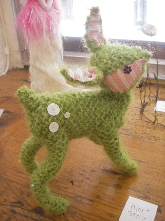 Green knitted deer