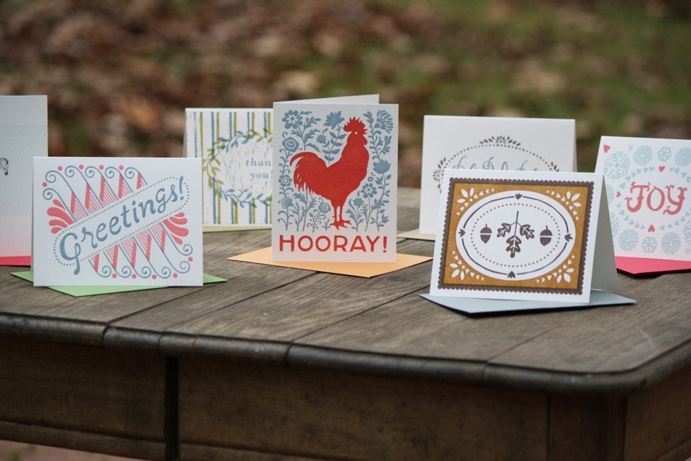seven assorted letterpress greeting cards