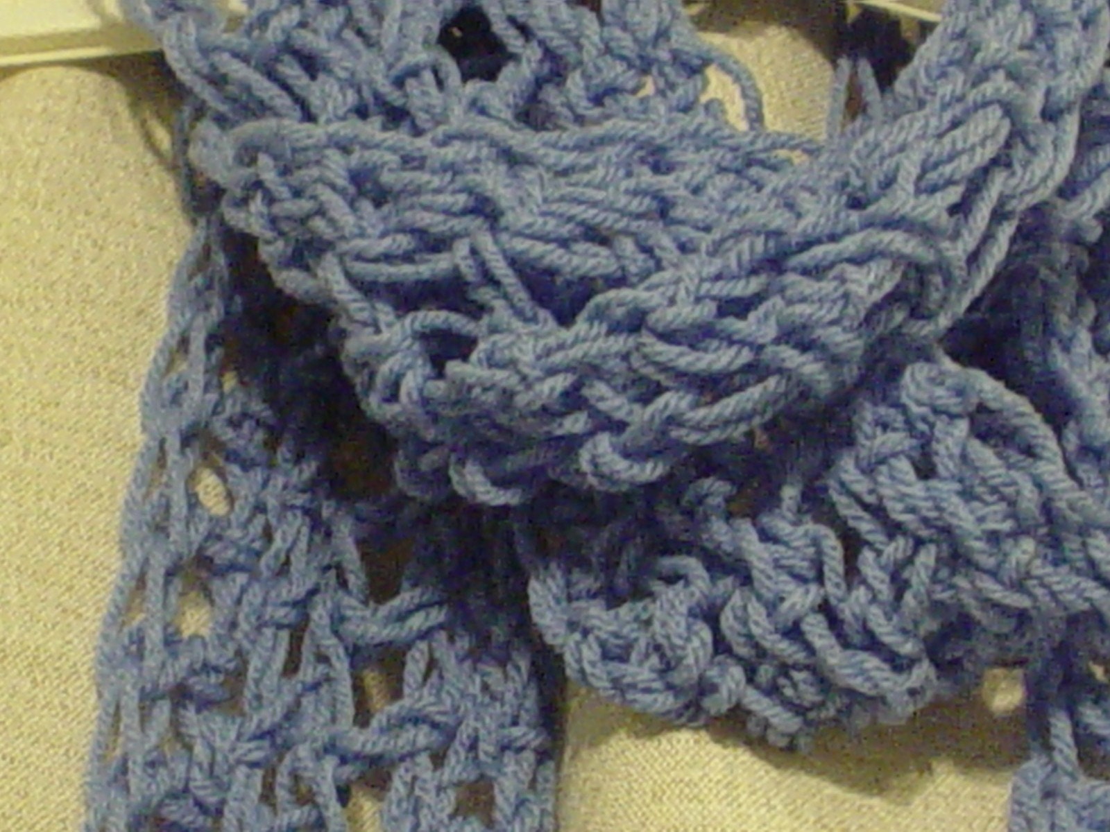 Loose stitch blue crochet scarf