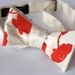 Poppy bow tie. Cream and dark coral freestyle & adjustable tie. Silkscreened floral necktie.