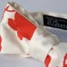 Poppy bow tie. Cream and dark coral freestyle & adjustable tie. Silkscreened floral necktie.