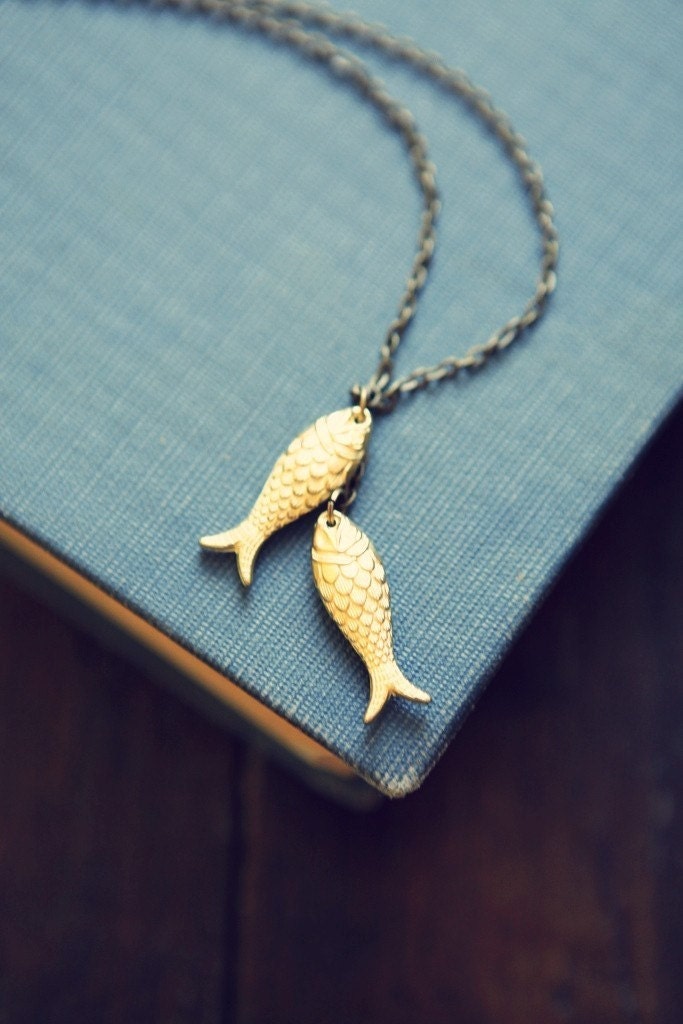koi necklace in vintage brass on a long chain