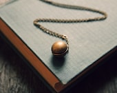 ball locket necklace in vintage brass, globe design, mothers day jewelry