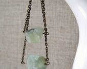 green necklace with layered multi chains and double prehnite stones