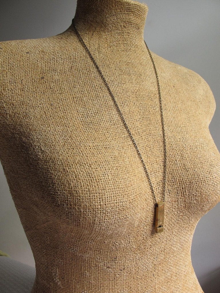 whistle statement necklace in brass on long minimal chain