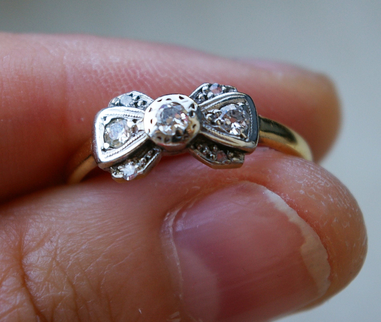 1920's Platinum, Diamond & 18k Gold Ribbon Bow Ring Size US 6
