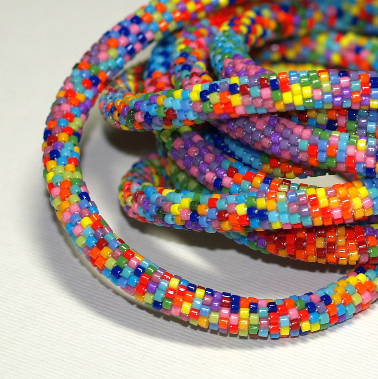 Zuri ... Bead Crochet Rope . Necklace . Bracelet . Multicolor . Colorful . Intricate . Patterned . Bold . Africa Inspired . Rainbow Colors