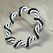 Let's Do the Twist ... Bracelet . Black and White . Bangle . Fun . Bead Crochet . Matte Beads . Classic Colors . Spirals