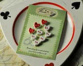 alice in wonderland tiny heart buttons....sew on buttons