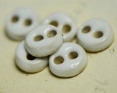 6 sweet  buttons in  white