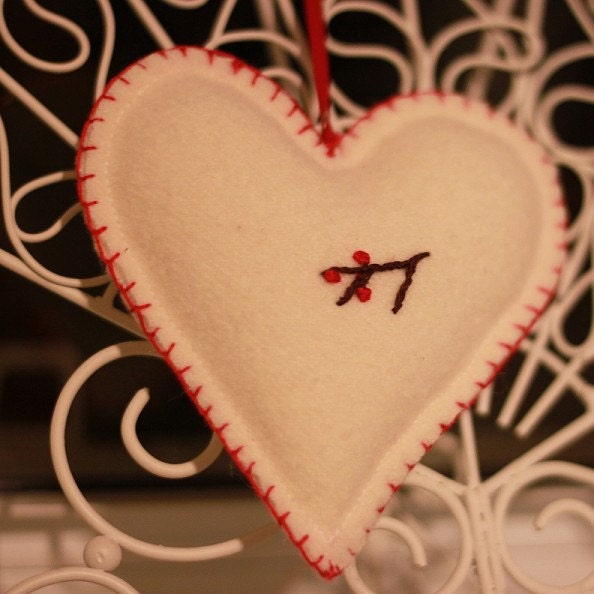 Single red berry heart