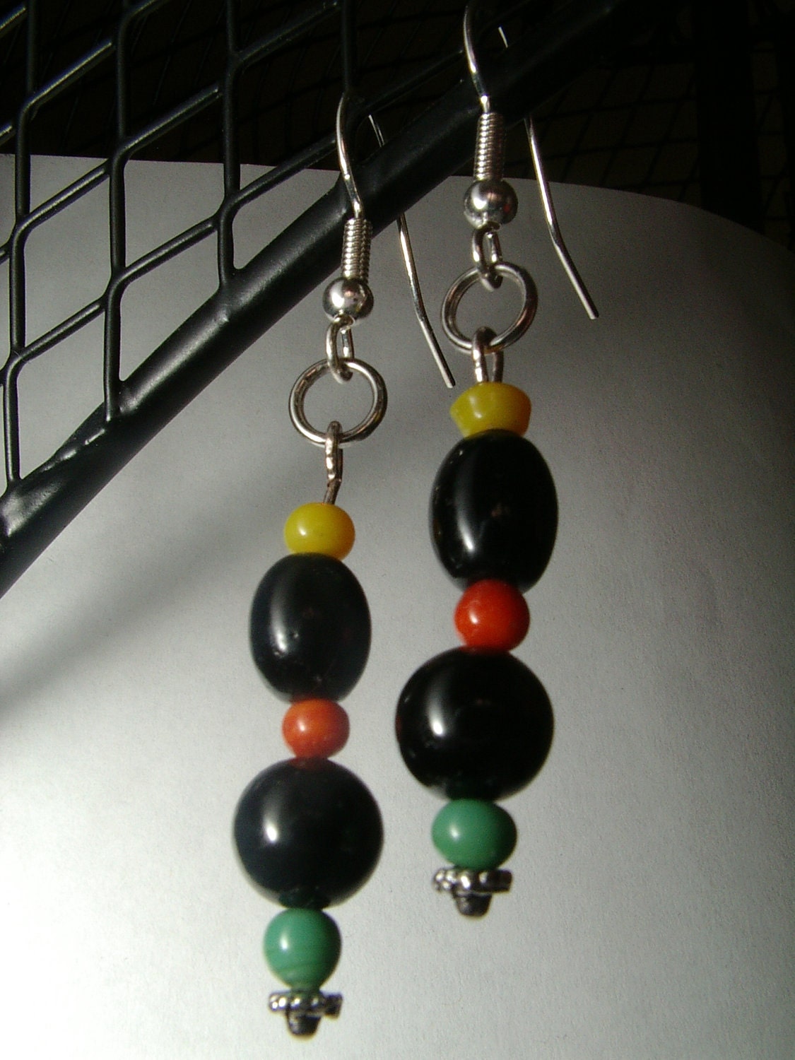 Yellow Orange Green black with silver accents dangle earrings