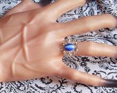 Goddess of the Deep Blue Storm Cat Eye Fiber Optic Stone Ring