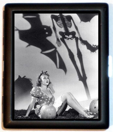 Classic Fifties Pinup Model Among Halloween Shadows Witches Black Bats & Skeletons Ghosts Cigarette or Business card or Wallet