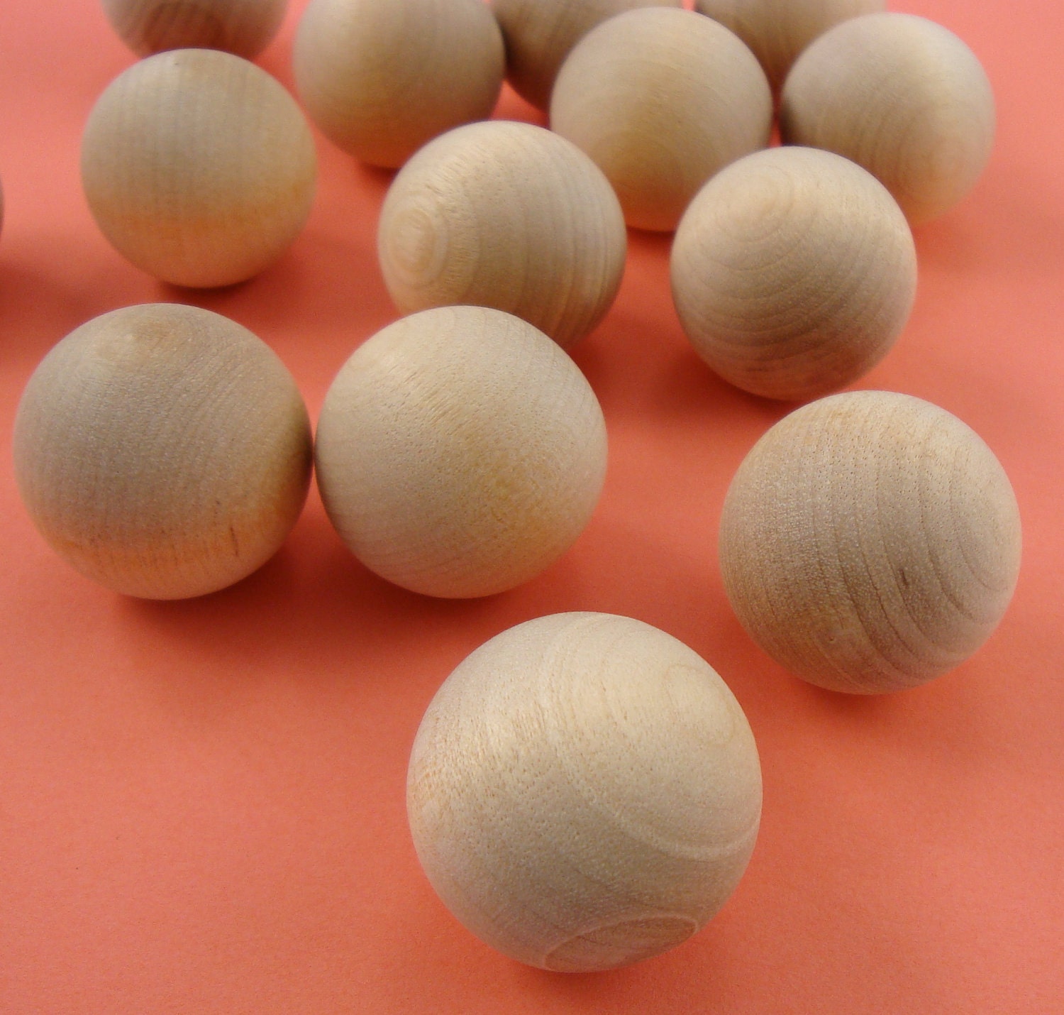 10 solid round wood balls . 1.25 inch . unfinished