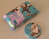 Matching tissue cozy and pocket mirror