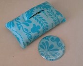 Matching tissue cozy and pocket mirror