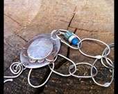 Big copper flower bracelet.
