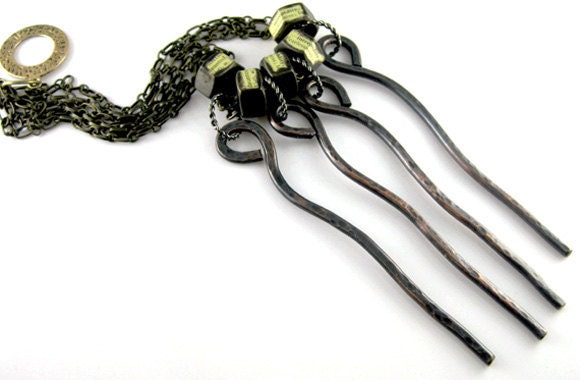 Urban chic.   Mixed metal very  stylish copper  brass  necklace. Hammered , oxidized by Fashion  BrandFaina.