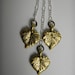 Gold Leaves Swinging on a Silver Chain