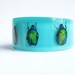 Blue lucite bracelet with real beetles