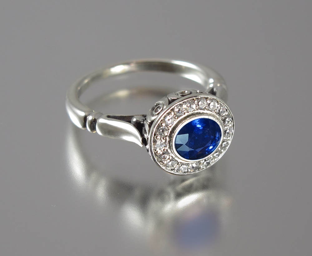 THE SECRET DELIGHT 14k gold Blue Sapphire engagement ring