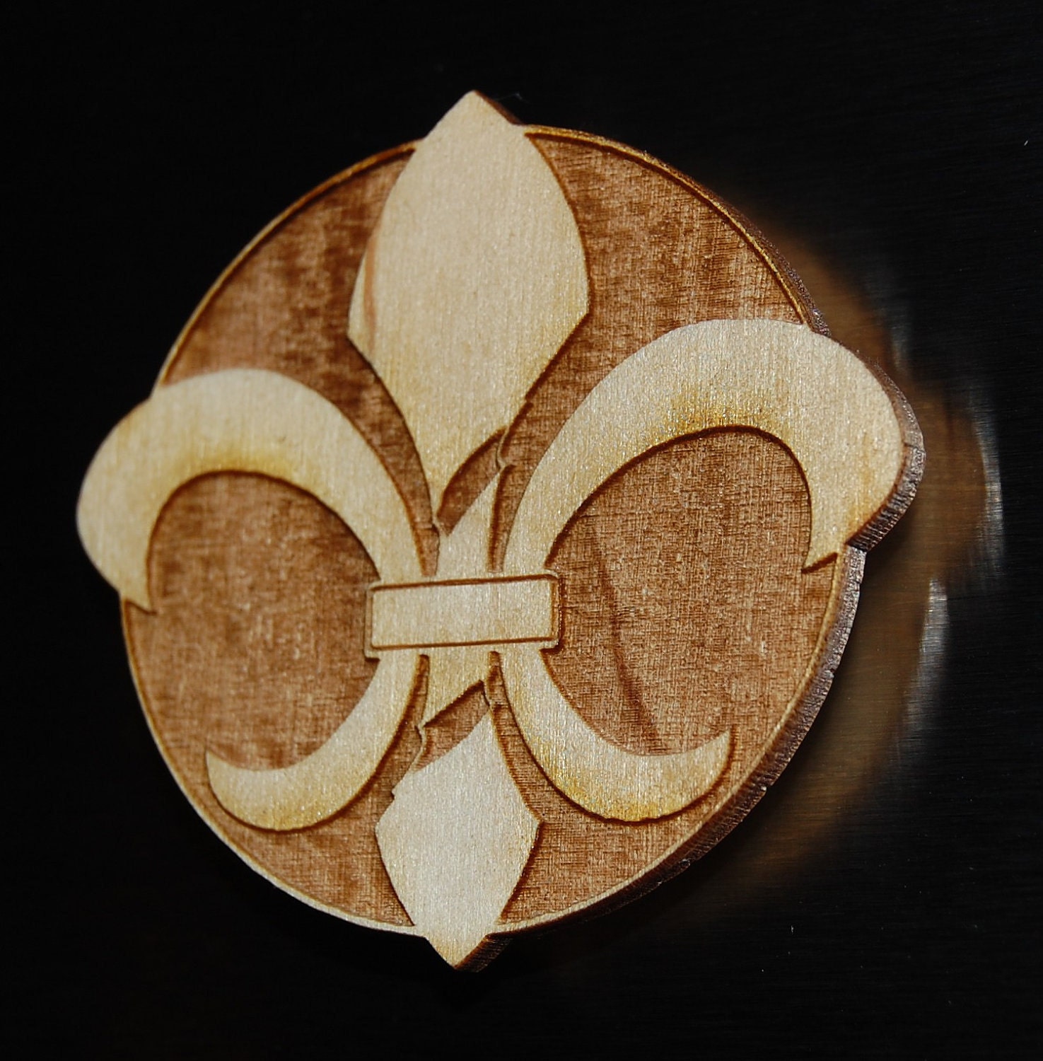 Twisted Fleur de Lis refrigerator magnet, New Orleans,