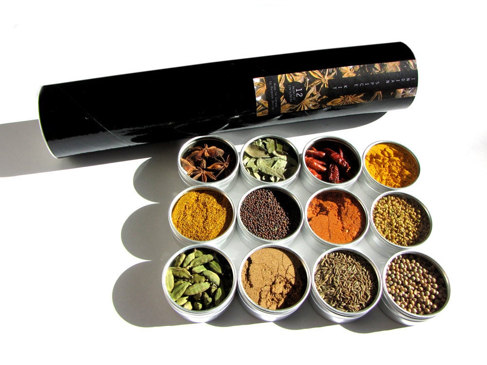 large magnetic indian spice kit with recipes included. the flavors of India at home in your kitchen.