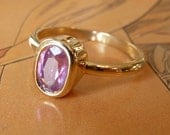Thulian Pink Oval Cut Sapphire Ring