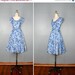 MAY SALE . vintage . 1950s . dress . WONDERLAND . hand painted . floral . full . swing . skirt