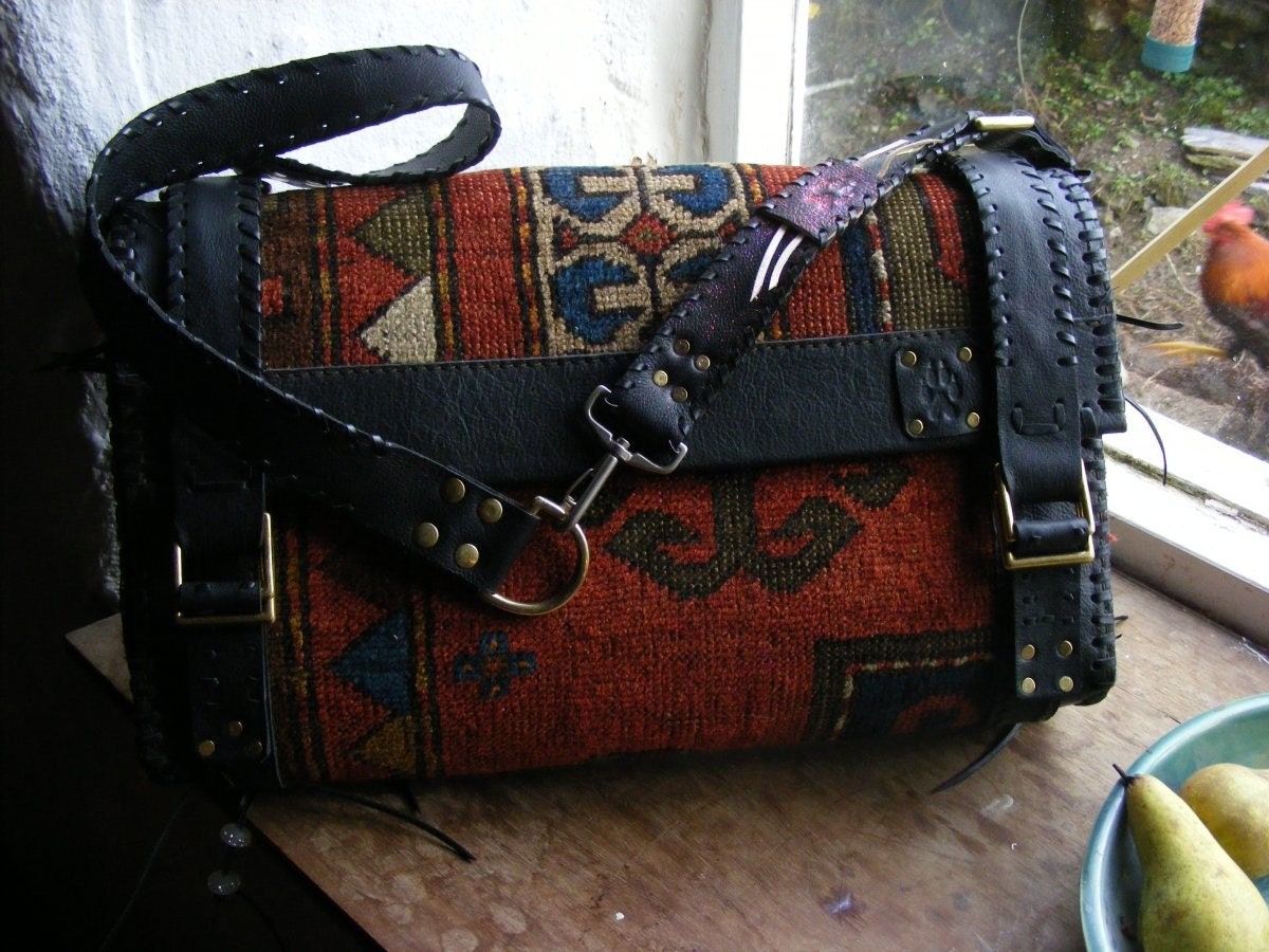 Carpet bag from Antique tribal rug Buffalo hide Mahogany Amethyst Waxed Leather