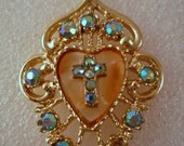 Vintage rhinestone mop cross pendant
