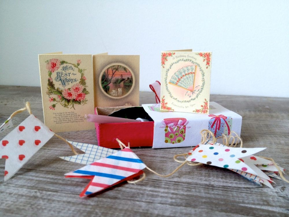 Altered vintage matchbox with a birthday party inside