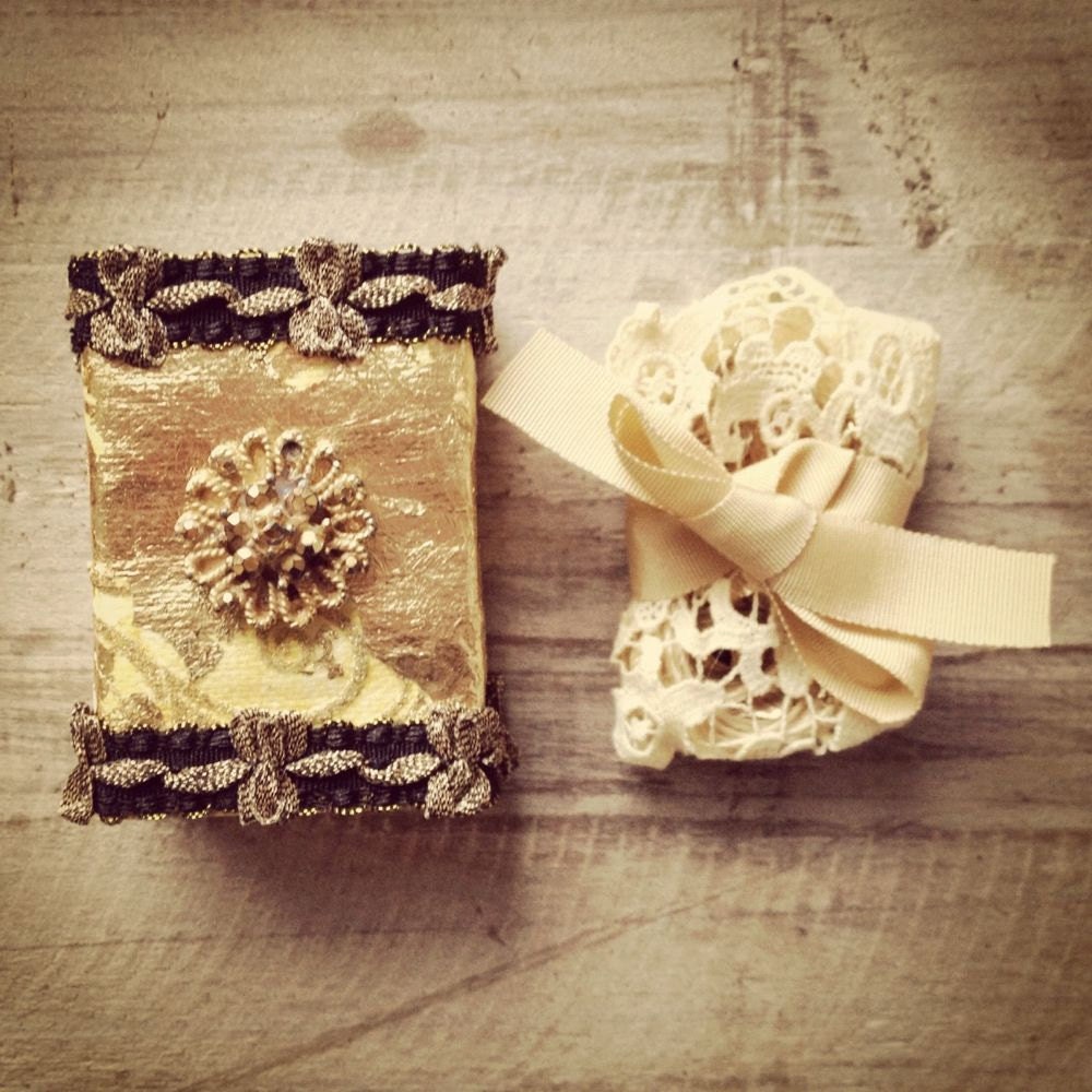 SALE Altered vintage matchbox with a delicate gold bell and leaves garland inside