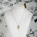 coraline necklace . organic gold coral branch .